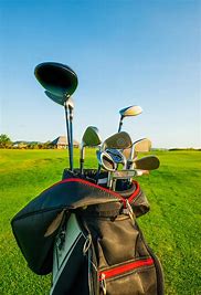 golf clubs, The Best Golf Club Deals And Equipment Online Golf Clubs - Picture of a set of golf clubs and bag on the course.